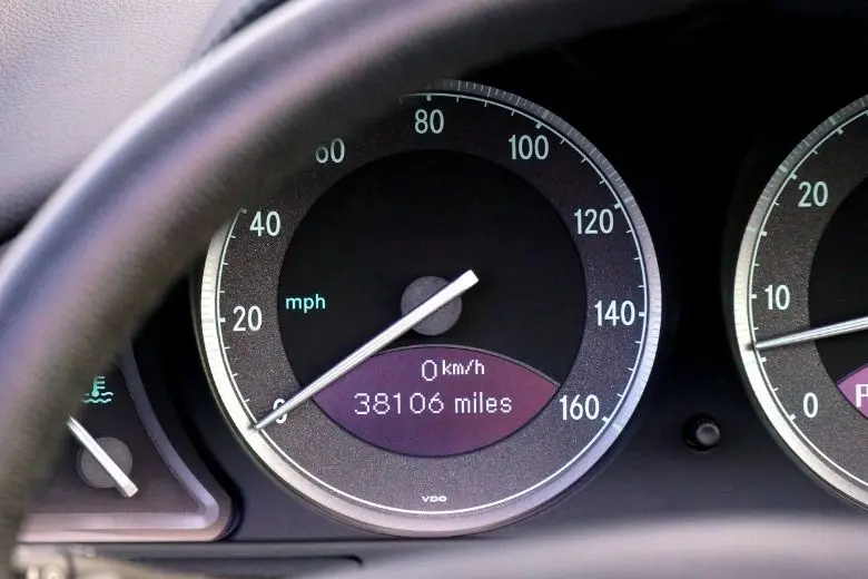 Used car odometer showing 38,106 miles